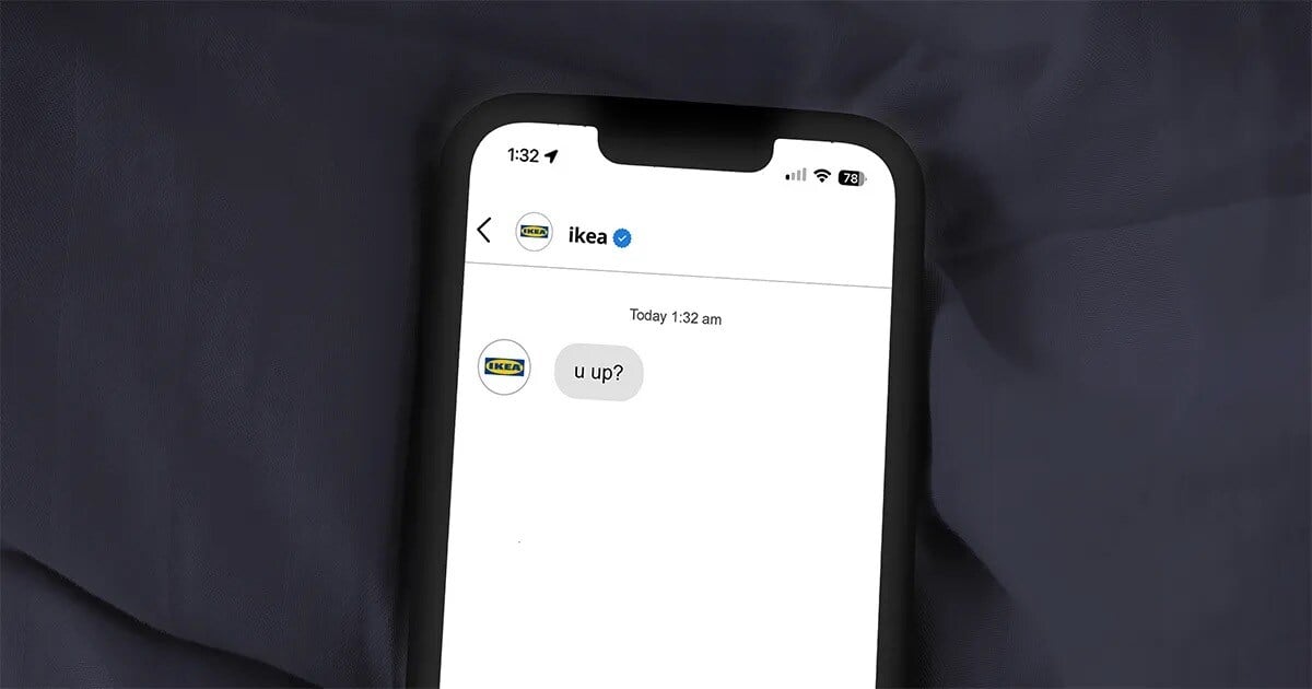 A mobile phone with the Instagram direct message chat open. The message is from the furniture brand IKEA and it says 'U up?'