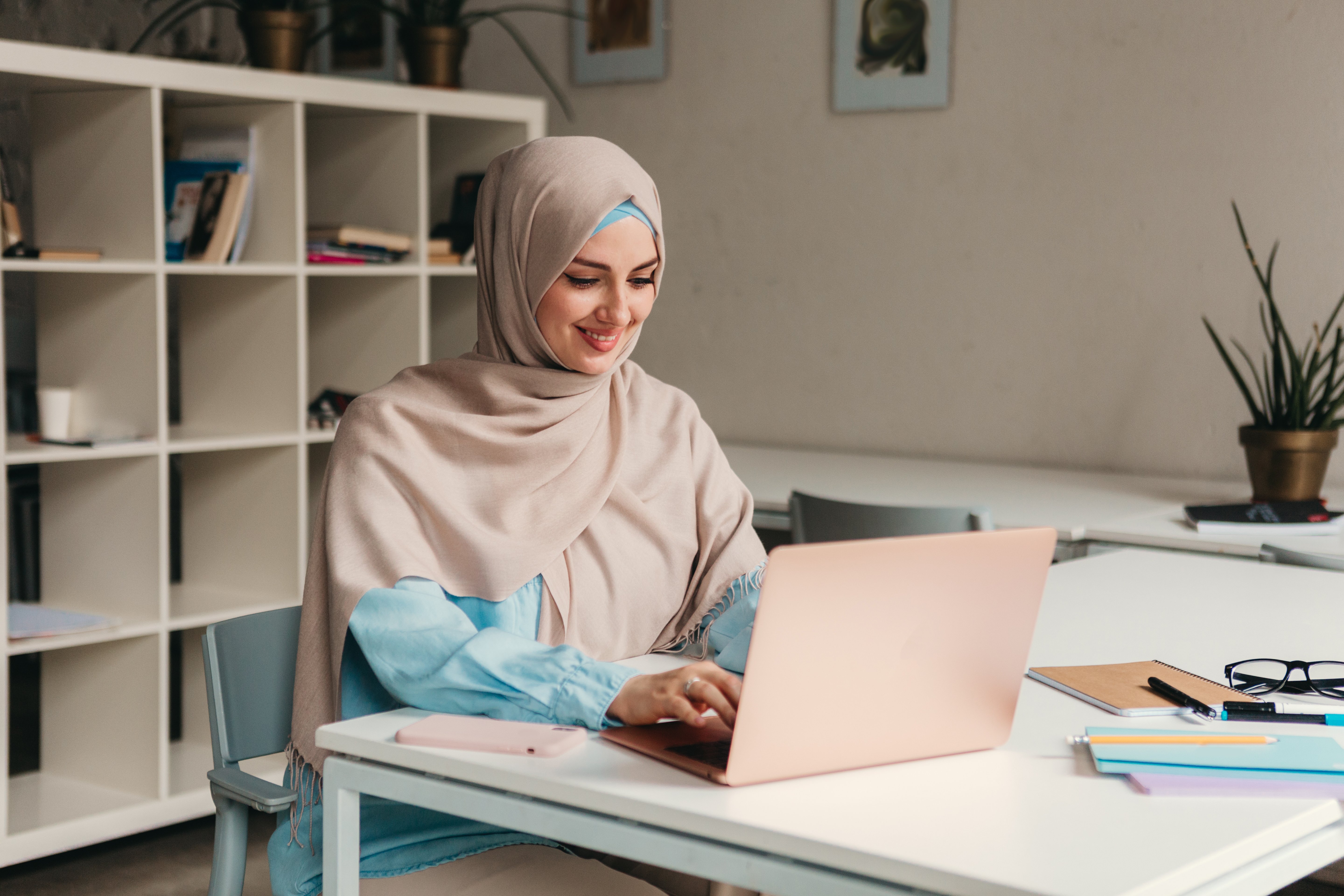 Woman Wearing Hijab Using Laptop